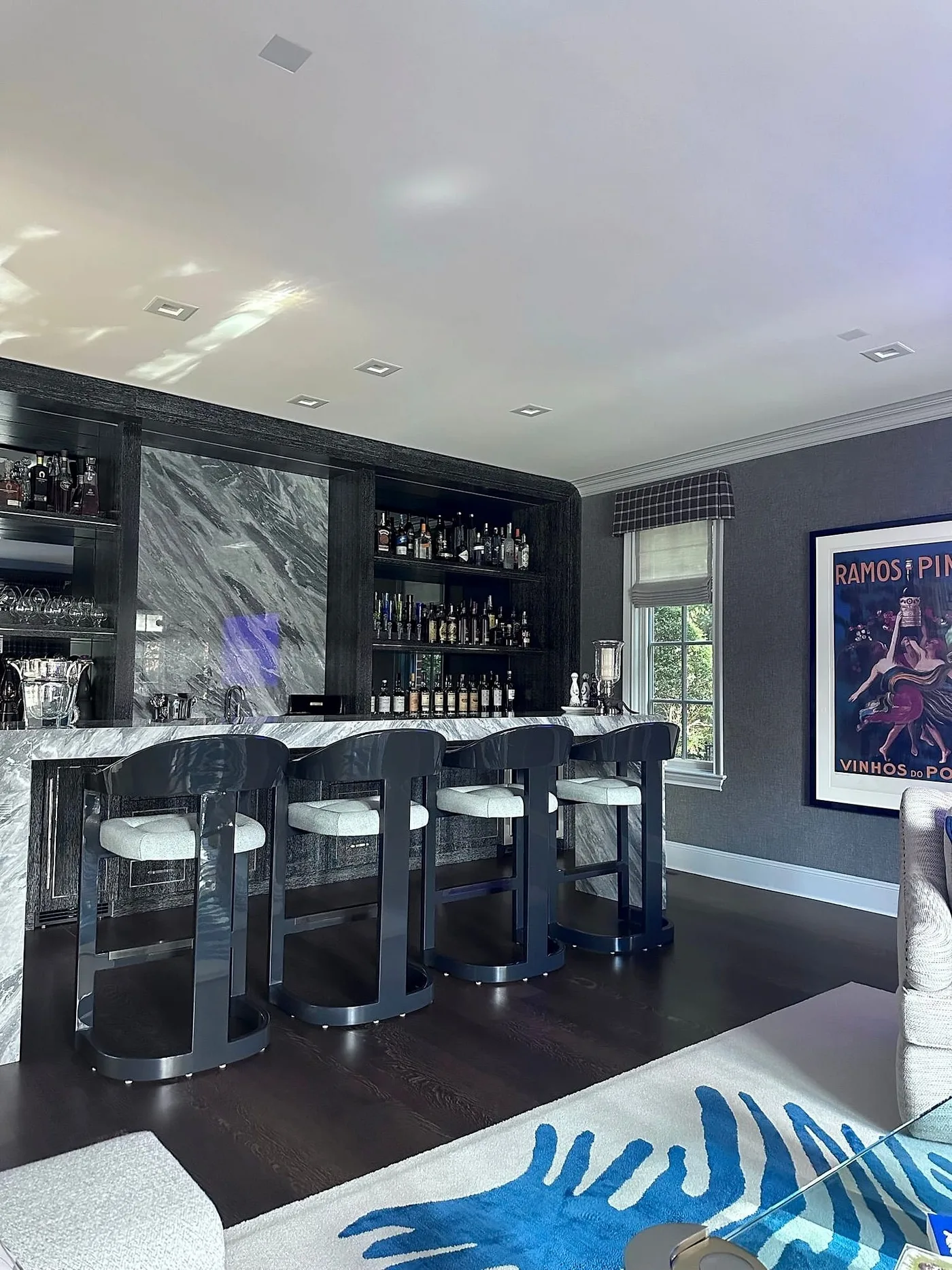 Home bar with James small-aperture ceiling speakers and recessed lighting