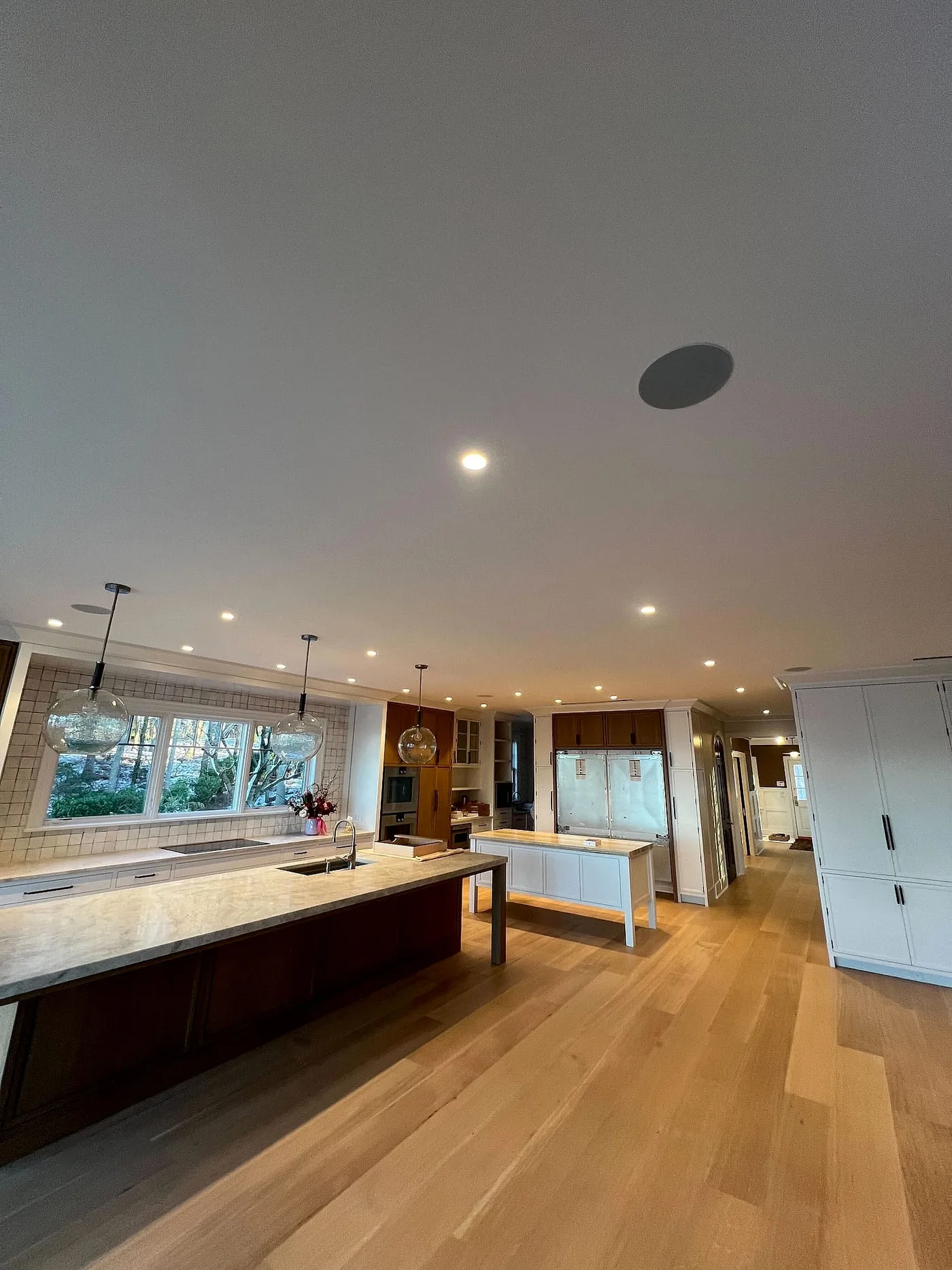 Kitchen with architectural ceiling speakers