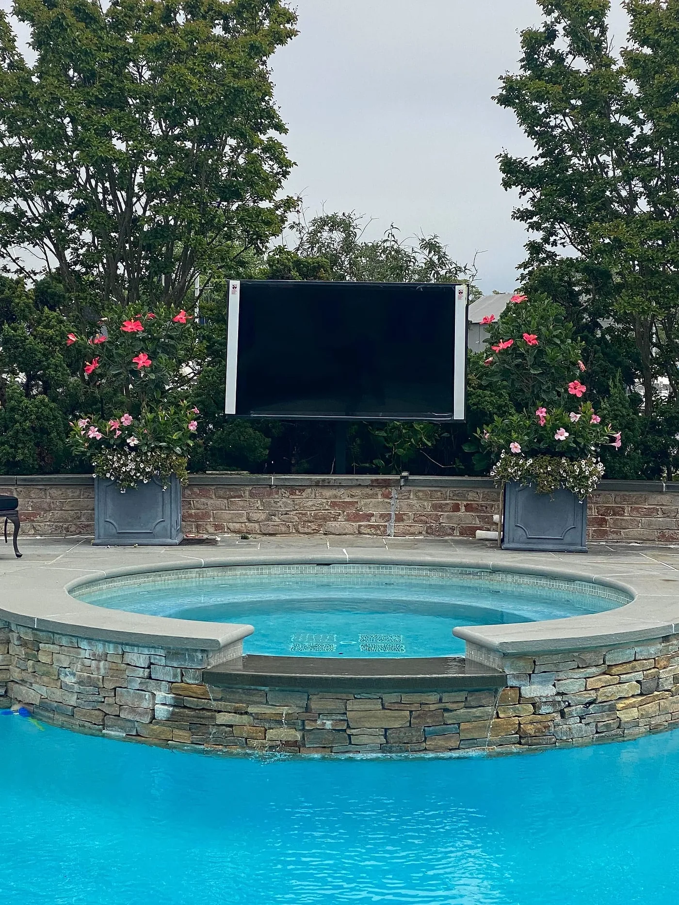 Outdoor display beside a spa