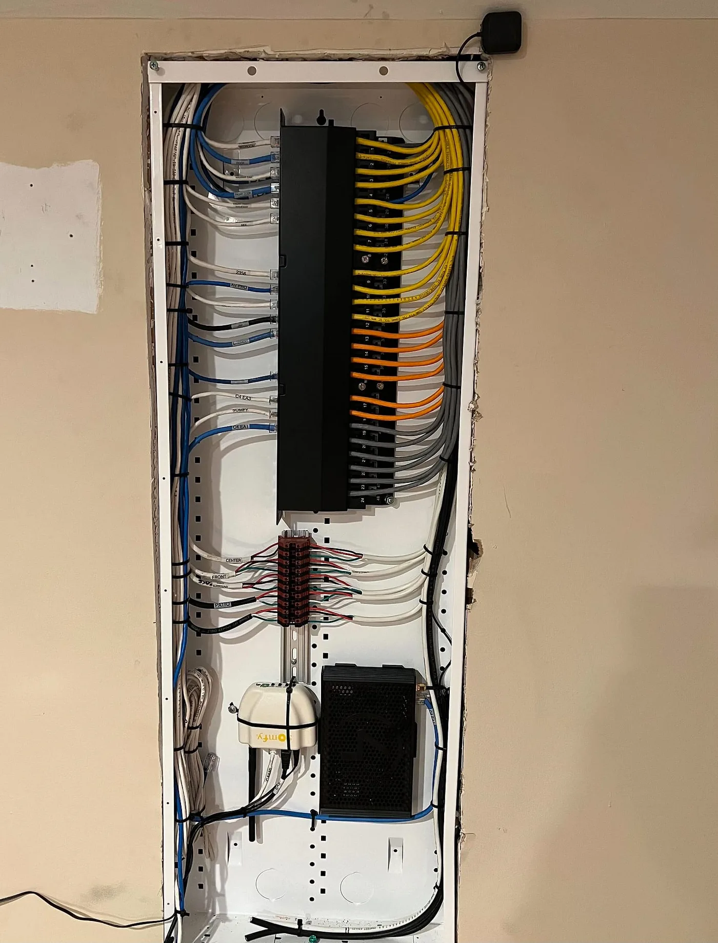 Low-voltage prewire cabling home-run and labeled in framing