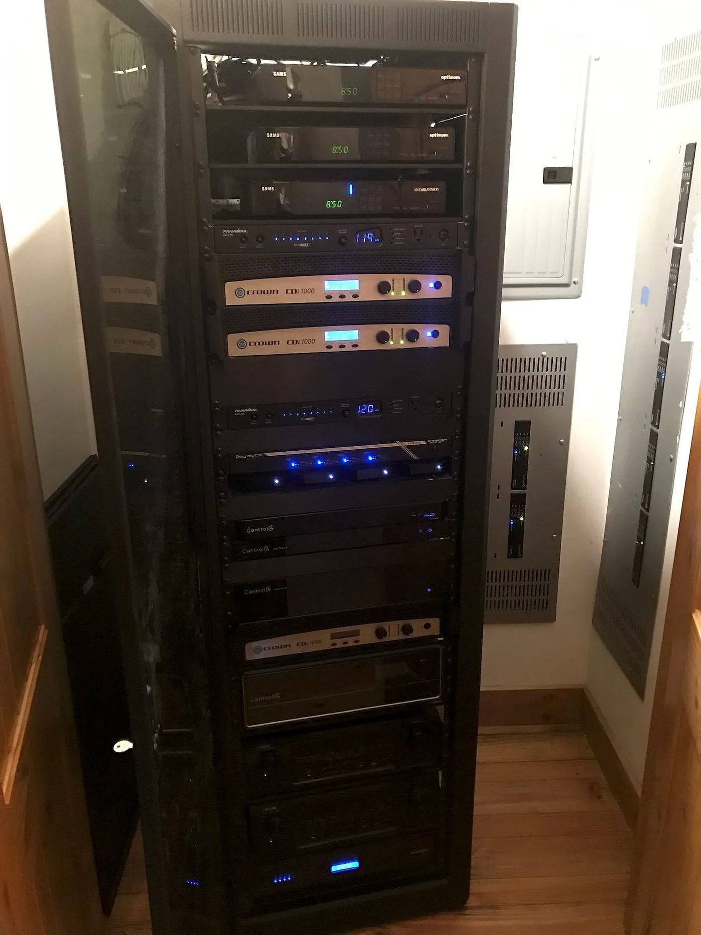 Equipment rack with front-mounted AV components