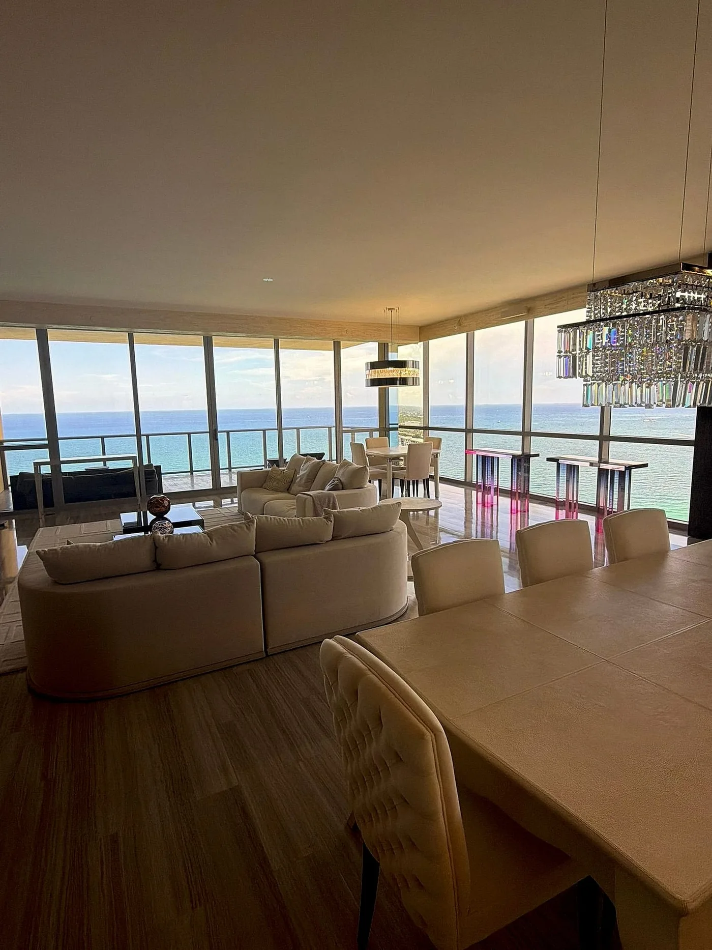 Open-plan living room beside a kitchen island