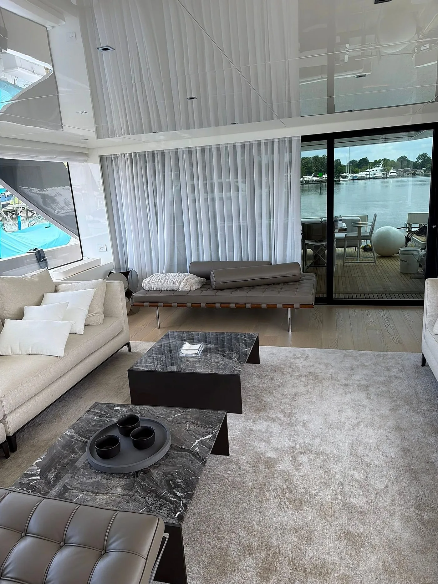 Living room with full-height curtains and seating