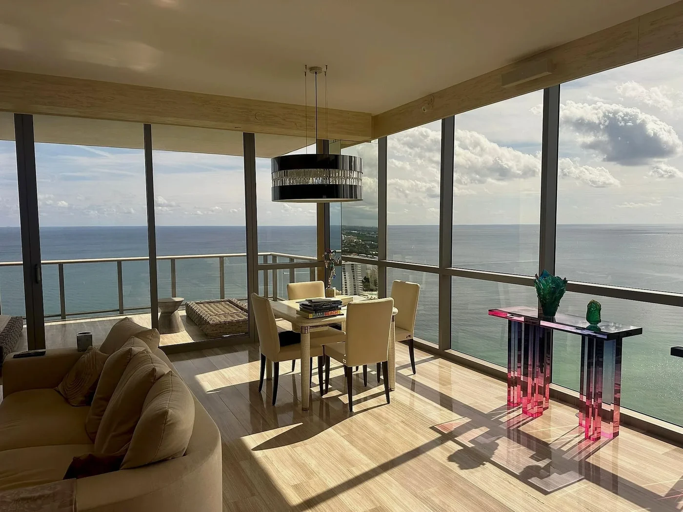 Waterfront dining space with panoramic windows