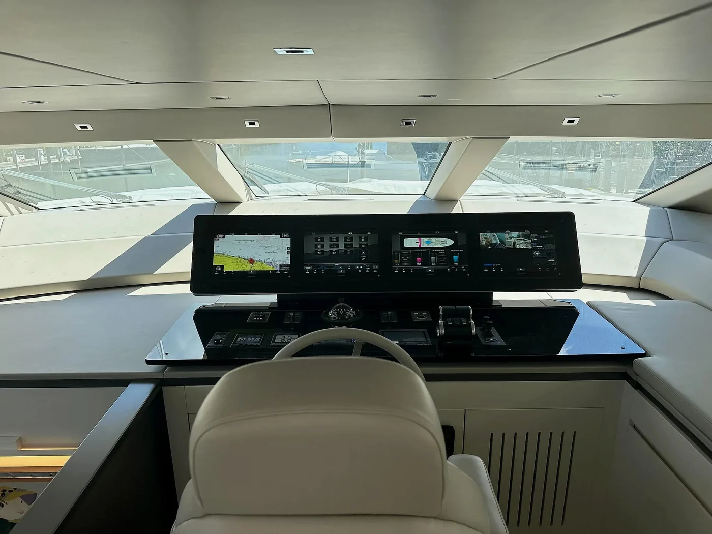 Yacht helm station with navigation displays