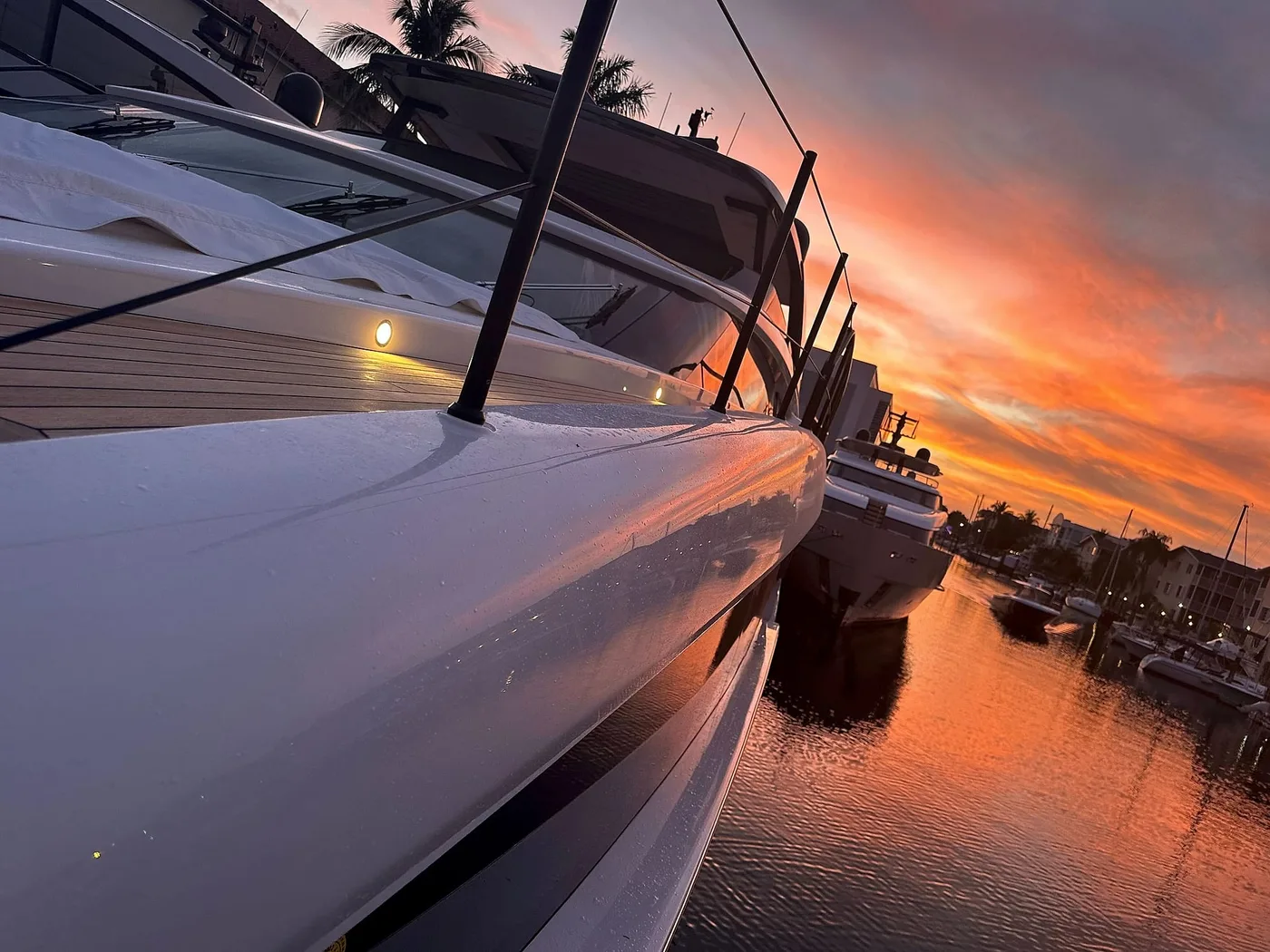 Yacht hull and exterior lighting at dusk